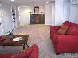 227 Elm Street Raleigh, NC 27601 - Photo 8 of 10 Huge daylight basement with fireplace & new flooring Other