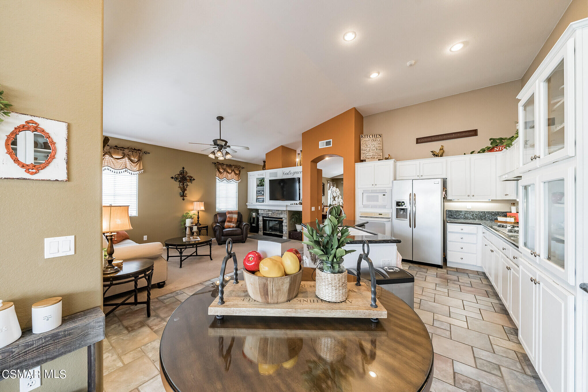 1990 Winterdew Avenue Simi Valley, CA 93065 - Photo 11 of 38 a view of a living room and kitchen with furniture