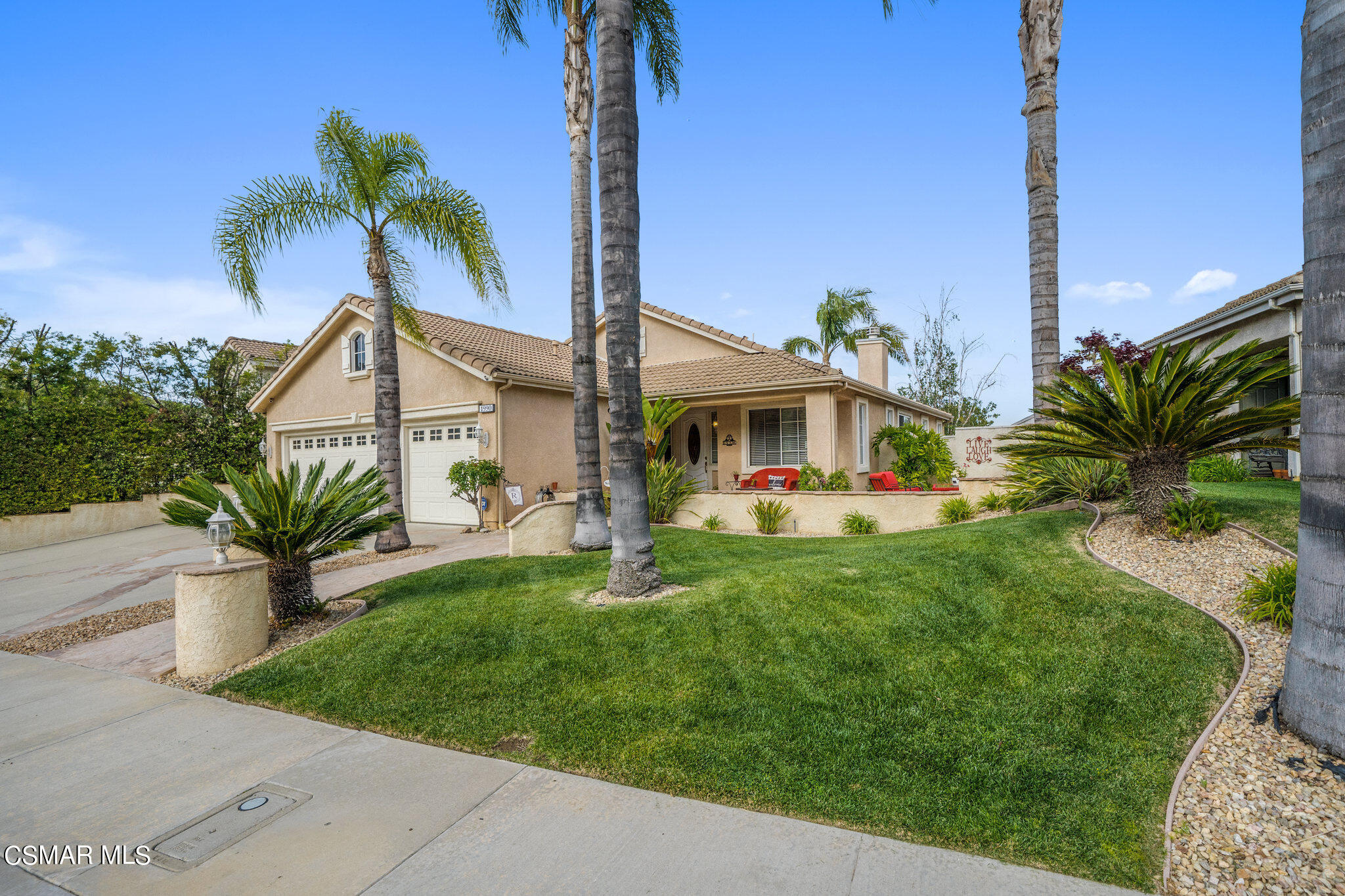 1990 Winterdew Avenue Simi Valley, CA 93065 - Photo 2 of 38 a view of a house with a yard