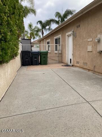 1990 Winterdew Avenue Simi Valley, CA 93065 - Photo 33 of 38 a front view of a house with a yard and garage