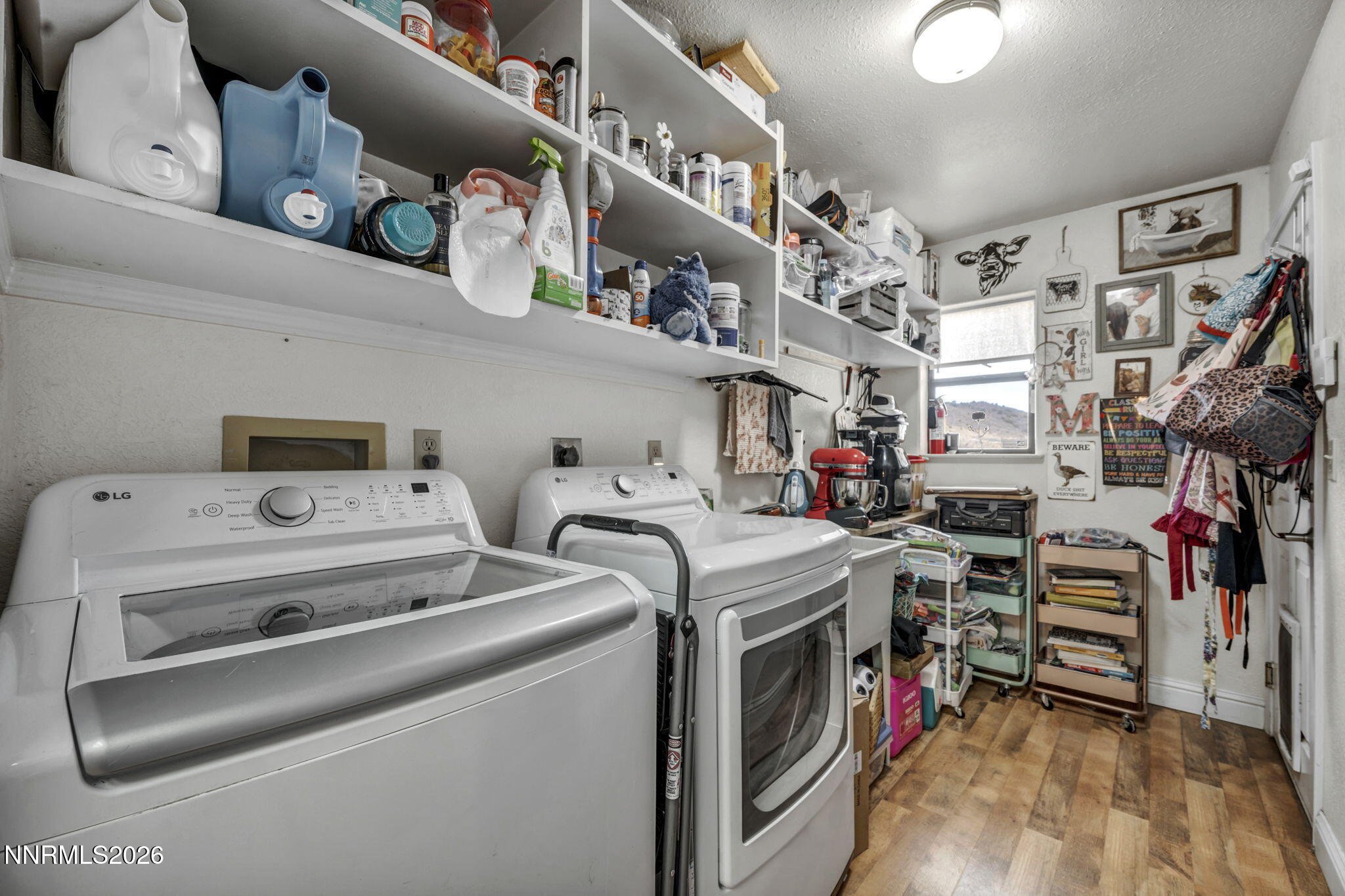 55 Buckboard Circle Reno, NV 89508 - Photo 13 of 39 a utility room with dryer and washer
