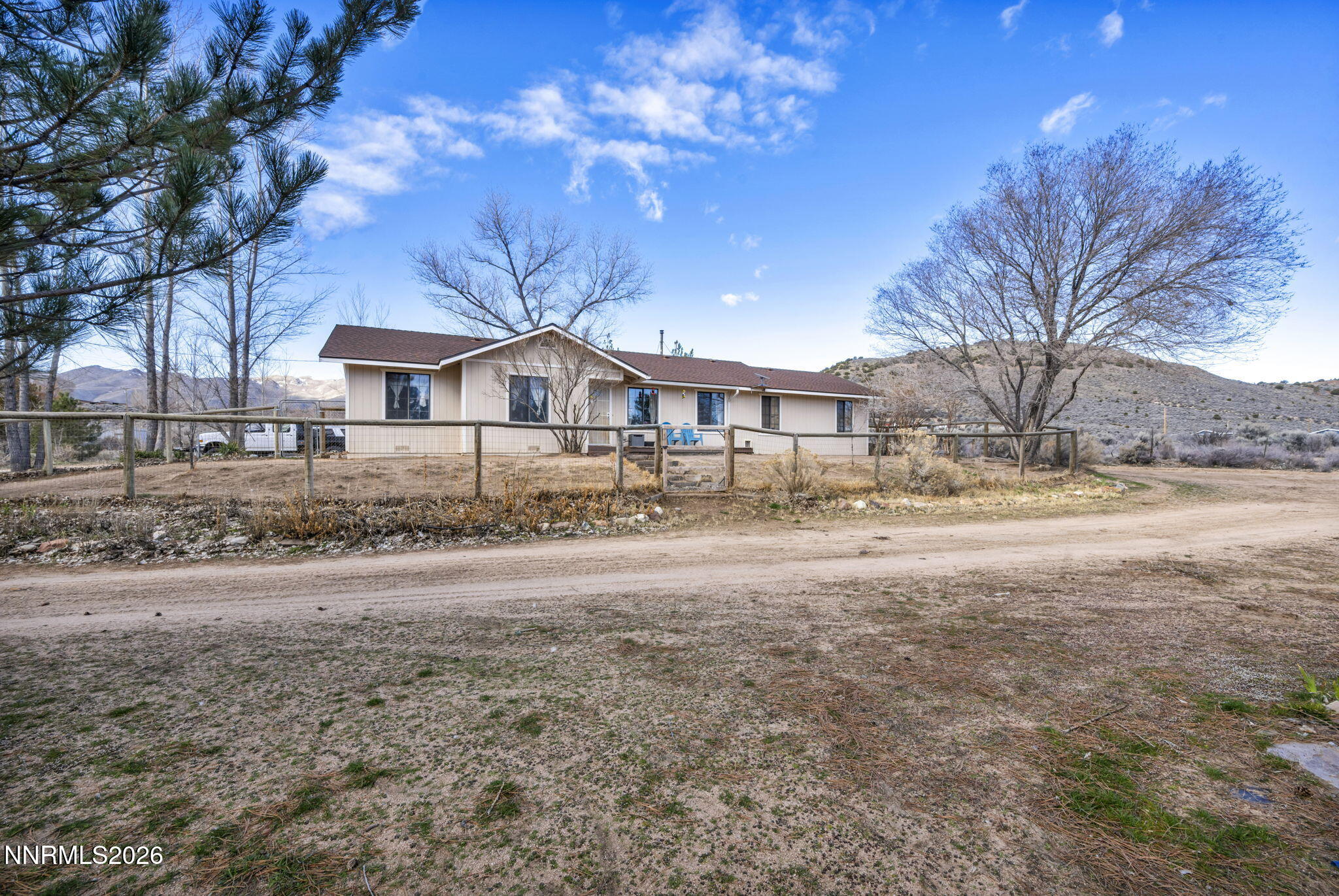 55 Buckboard Circle Reno, NV 89508 - Photo 2 of 39 a city view with tall trees