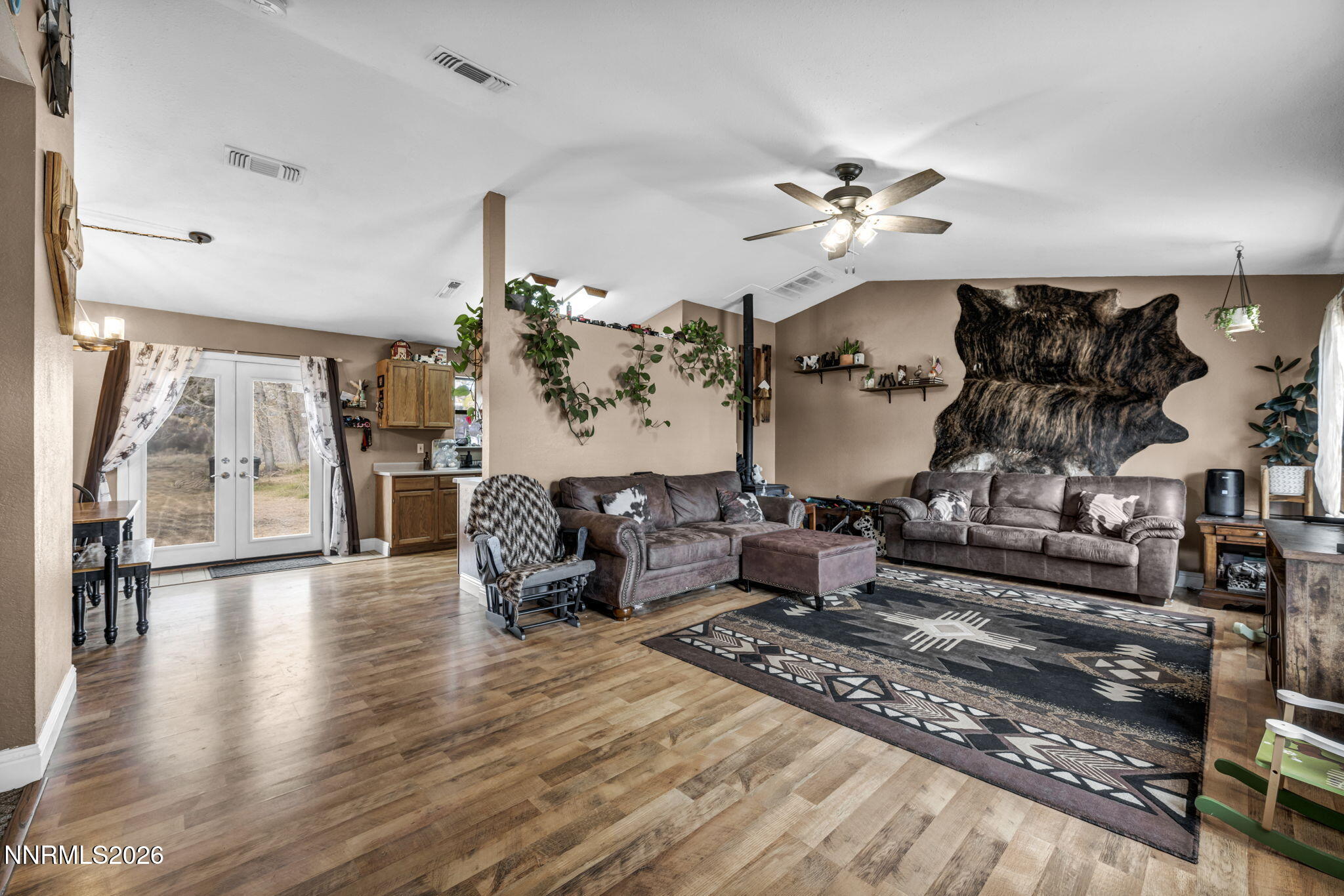 55 Buckboard Circle Reno, NV 89508 - Photo 7 of 39 a living room with furniture and wooden floor