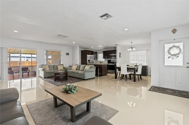a living room with furniture and a table