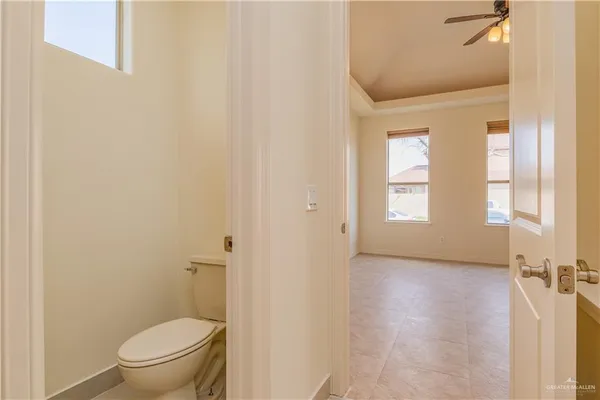 a bathroom with a toilet and a sink