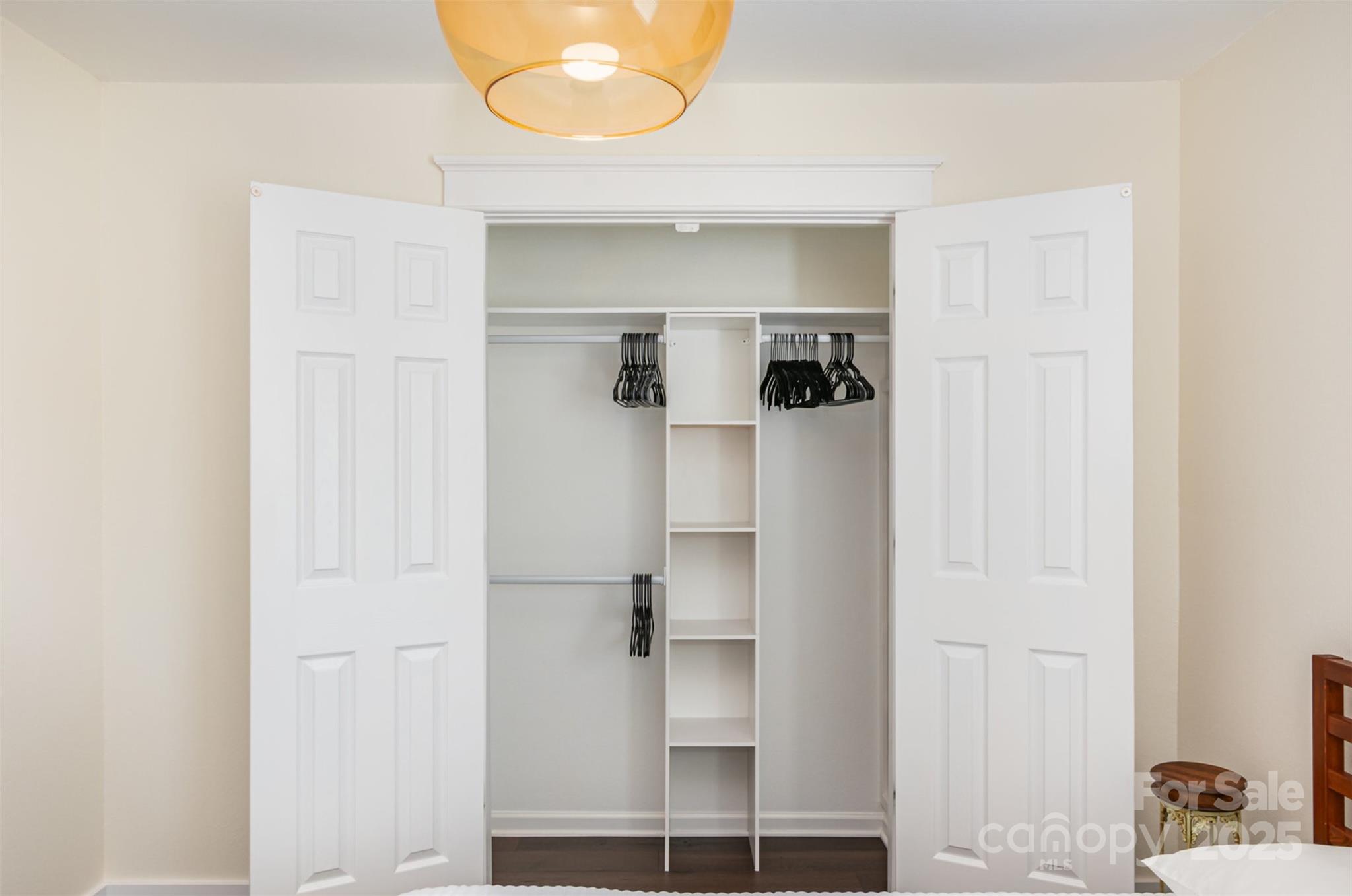 1124 Culver Spring Way Charlotte, NC 28215 - Photo 21 of 32 a view of walk in closet with cabinet and entryway