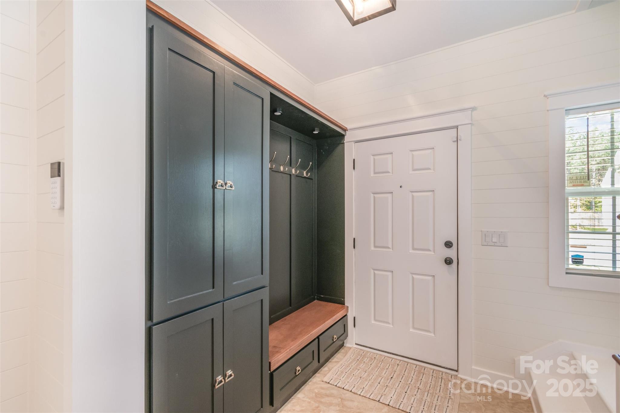 1124 Culver Spring Way Charlotte, NC 28215 - Photo 3 of 32 a bathroom with a shower and closet