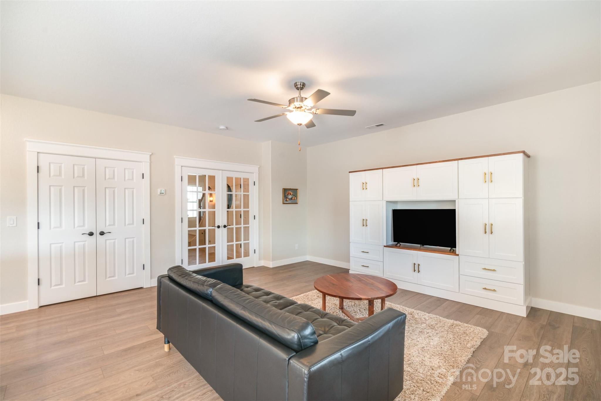 1124 Culver Spring Way Charlotte, NC 28215 - Photo 10 of 32 a living room with furniture and a fireplace