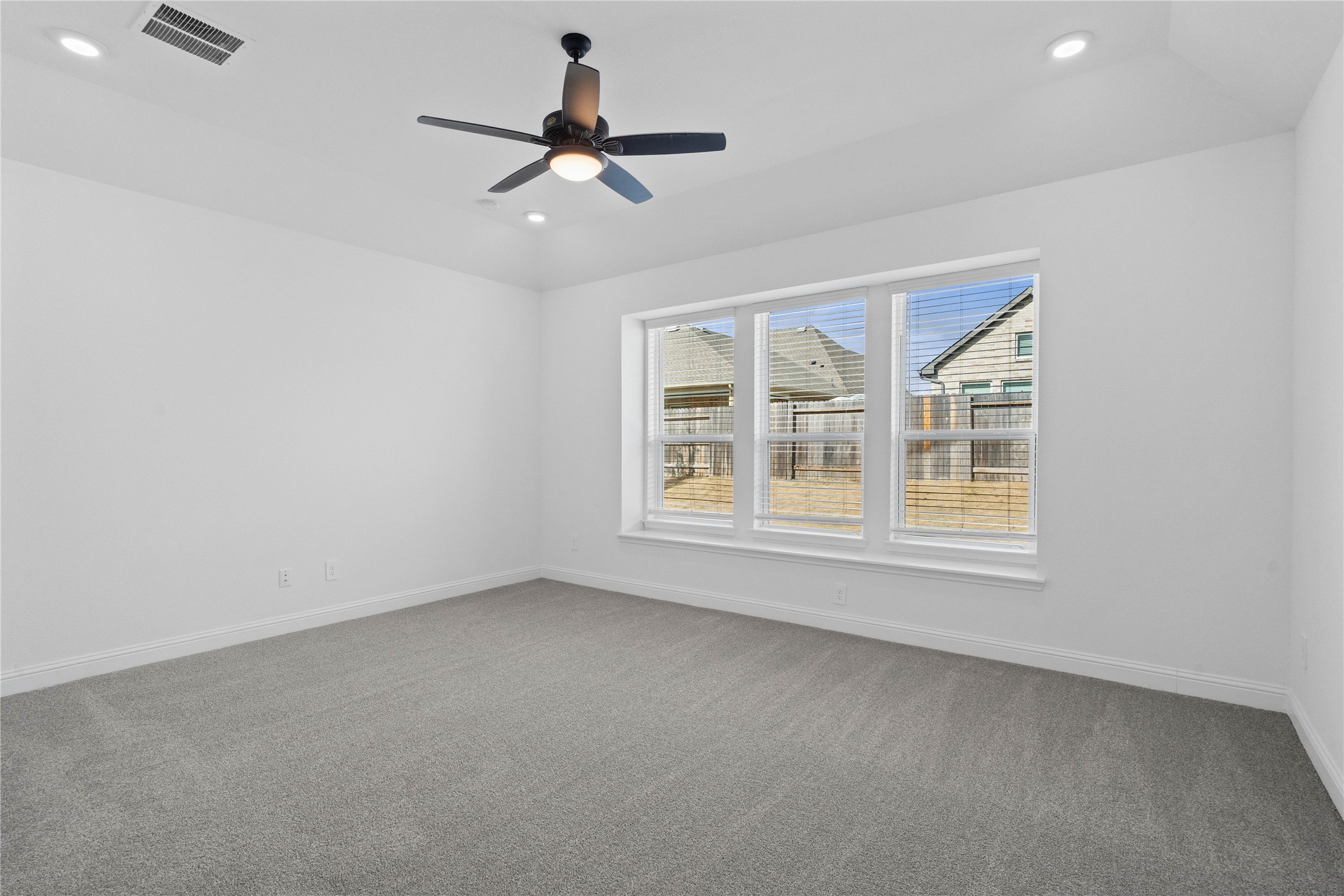 17315 July Moon Lane Conroe, TX 77302 - Photo 23 of 46 a view of an empty room with a window