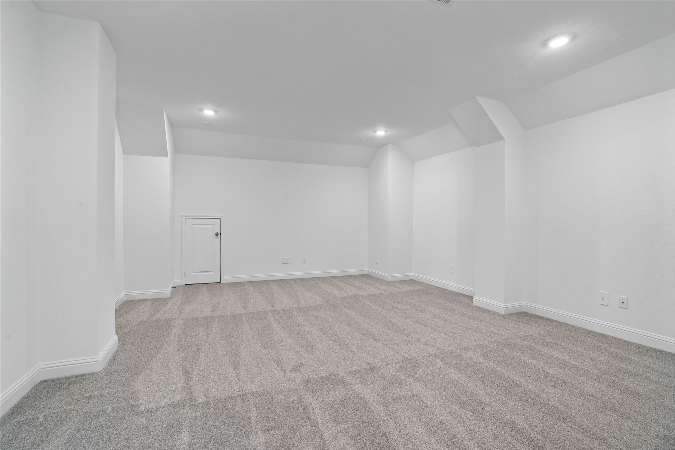 17315 July Moon Lane Conroe, TX 77302 - Photo 35 of 46 Grab the popcorn, put on a movie, and enjoy a wonderful evening in your amazing media room! Featuring plush carpet, custom paint, custom lighting makes this the perfect room for relaxing!