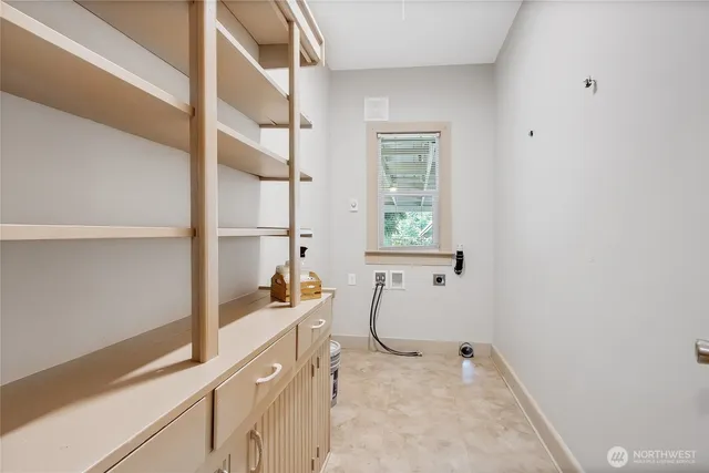 a bathroom with a sink and a window