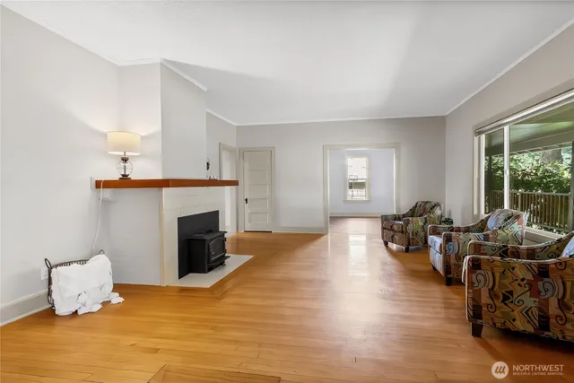 a view of a livingroom with furniture and a fireplace