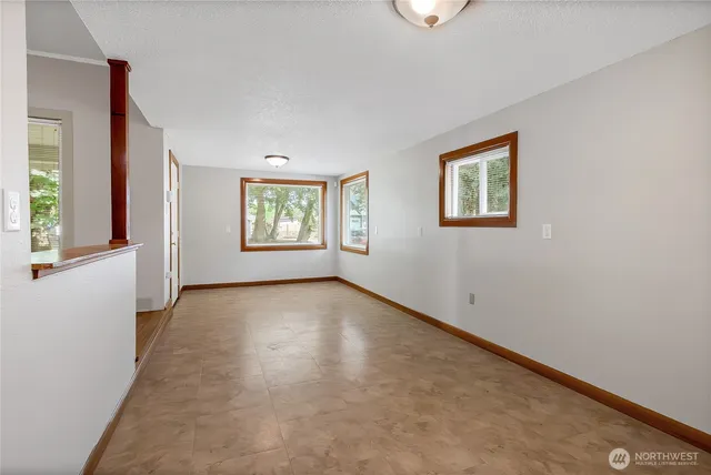 an empty room with windows