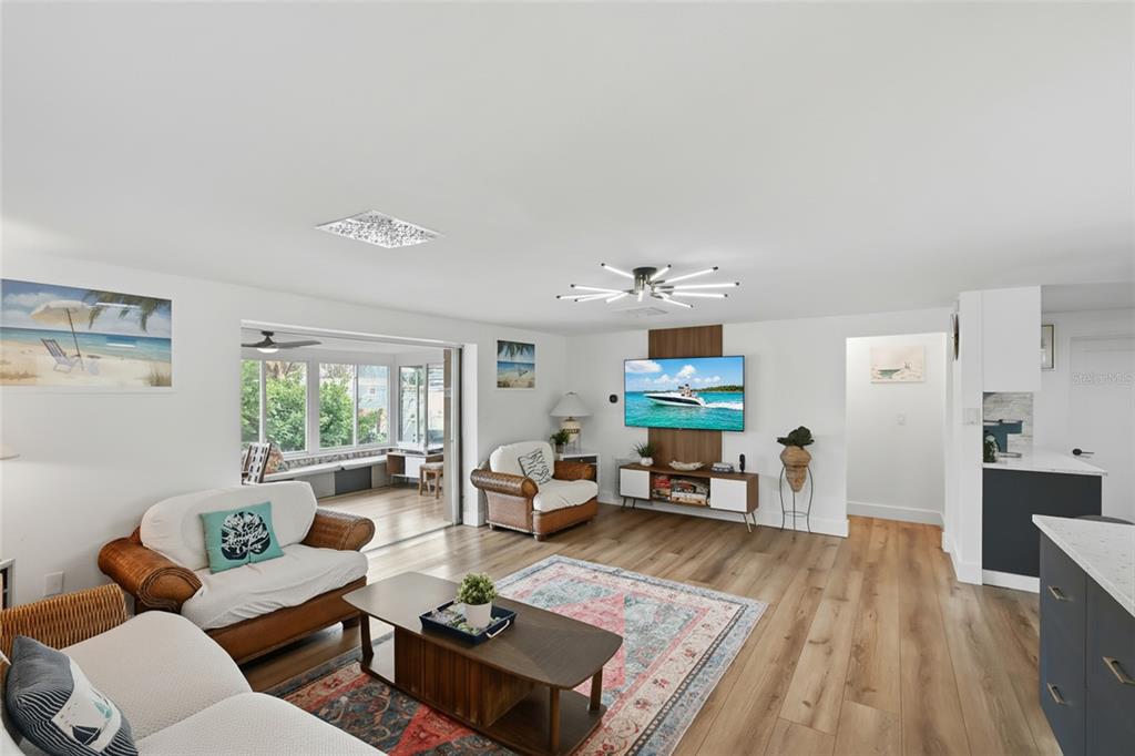 4107 Magnolia Drive Ellenton, FL 34222 - Photo 12 of 41 a living room with furniture and a wooden floor