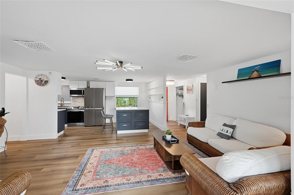 4107 Magnolia Drive Ellenton, FL 34222 - Photo 13 of 41 a living room with furniture and a fireplace