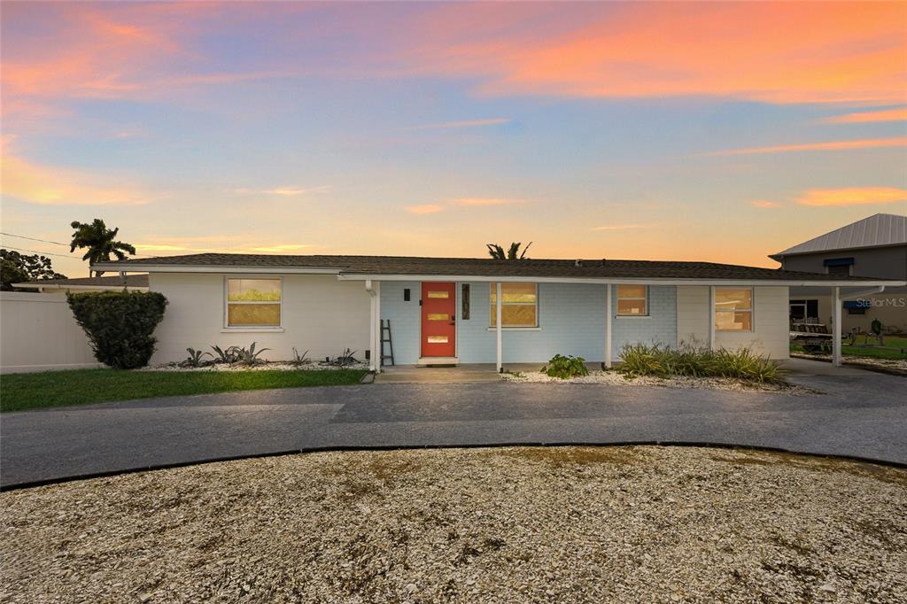 4107 Magnolia Drive Ellenton, FL 34222 - Photo 2 of 41 a front view of a house with a yard