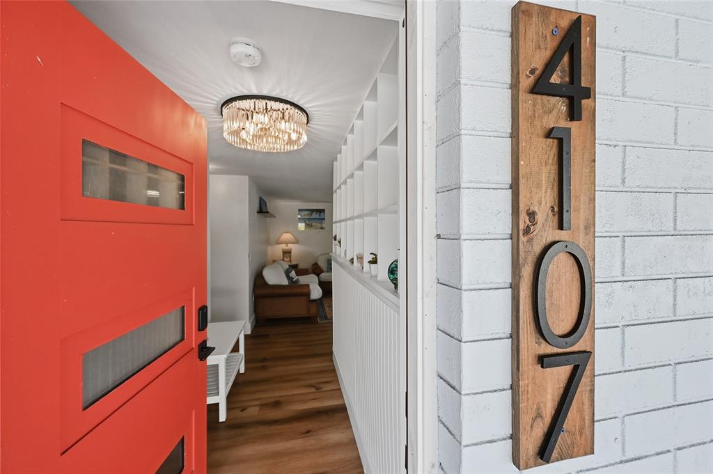 4107 Magnolia Drive Ellenton, FL 34222 - Photo 3 of 41 a view of a hallway with wooden floor