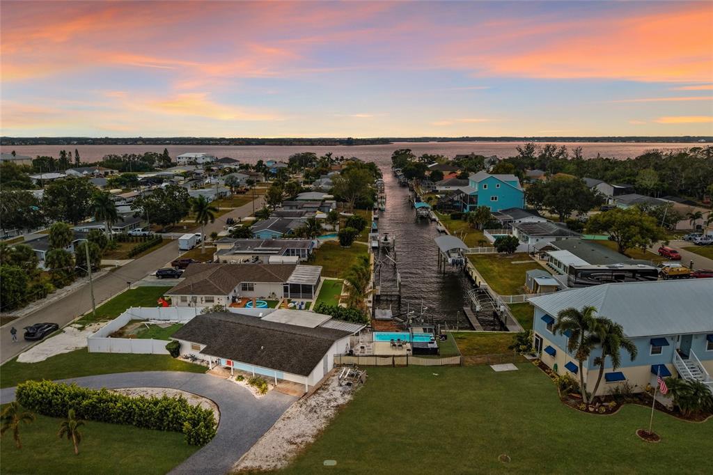 4107 Magnolia Drive Ellenton, FL 34222 - Photo 38 of 41 an aerial view of a city with lots of residential buildings ocean and mountain view in back