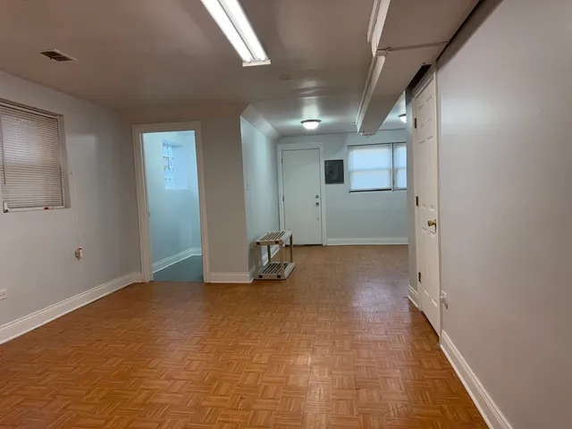 a view of a livingroom with a staircase
