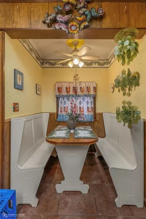 a view of a living room with a couch and a chandelier
