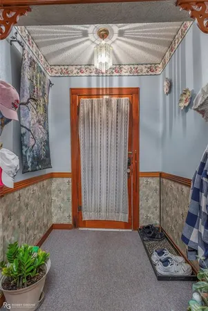 a view of livingroom with furniture and chandelier