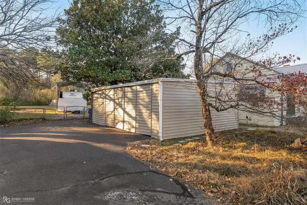a view of a house with a street