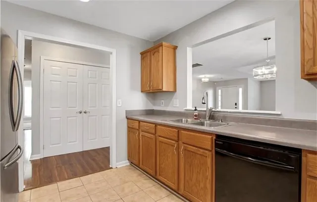 a kitchen with a stove microwave and refrigerator