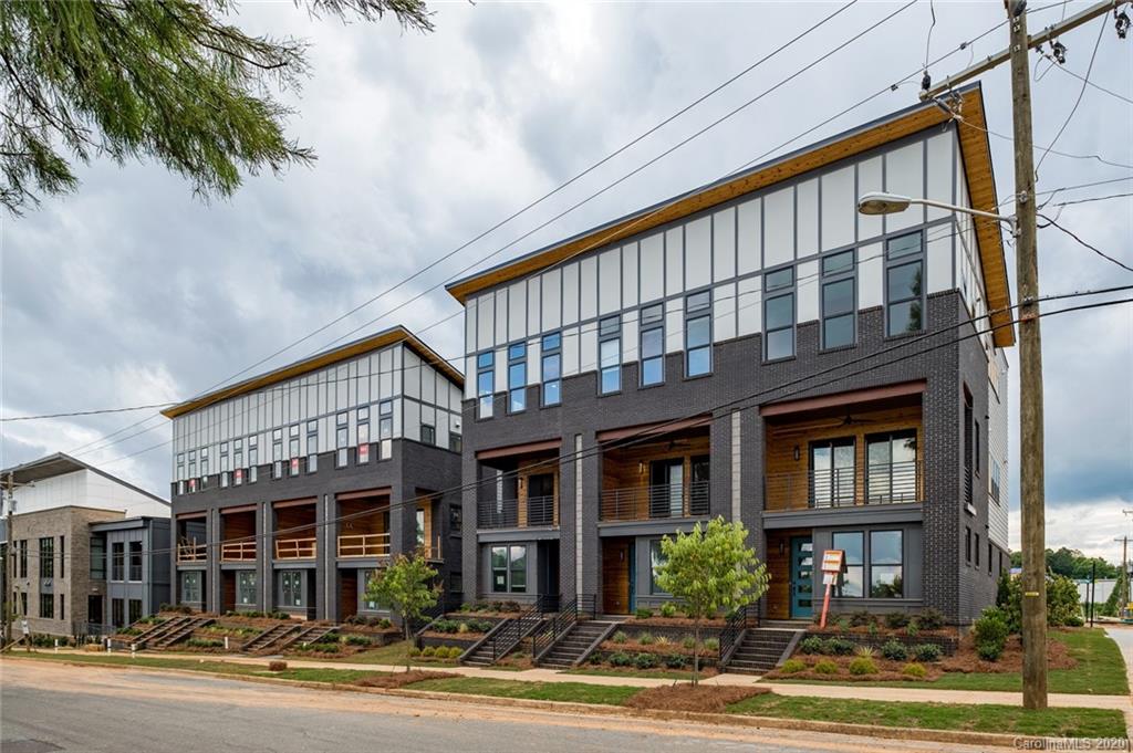 a front view of a building and a yard