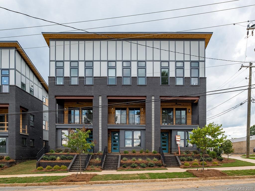 2531 Irwin Stream Road, Unit 20 Charlotte, NC 28208 - Photo 2 of 18 a front view of a building with street view and glass windows