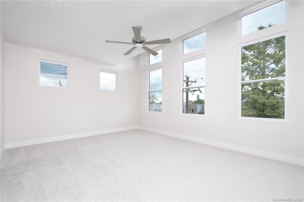 2531 Irwin Stream Road, Unit 20 Charlotte, NC 28208 - Photo 13 of 18 a view of an empty room with a window