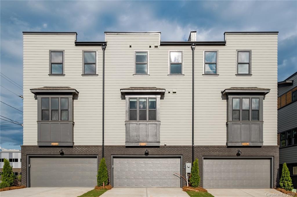 2531 Irwin Stream Road, Unit 20 Charlotte, NC 28208 - Photo 17 of 18 a front view of a house with stairs