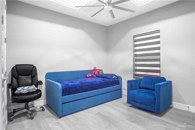 a living room with a couch and a chair