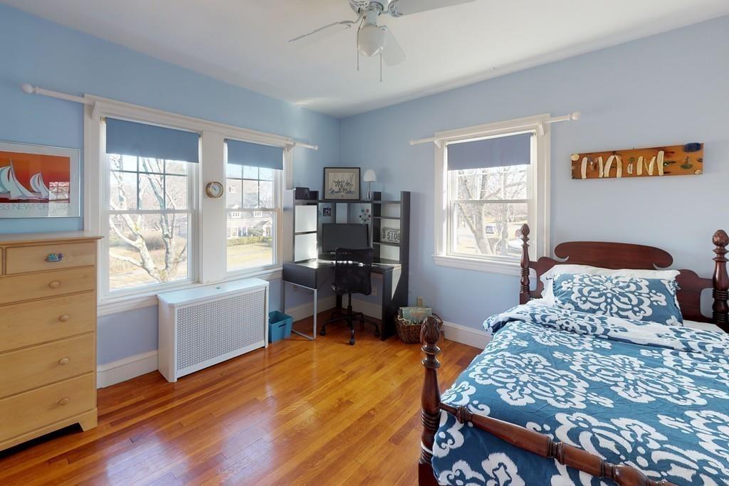 1 Mitchell Road Marblehead, MA 01945 - Photo 17 of 22 a bedroom with a bed and wooden floor