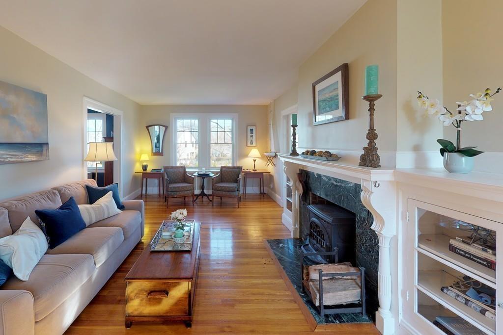 1 Mitchell Road Marblehead, MA 01945 - Photo 5 of 22 a living room with furniture and a fireplace