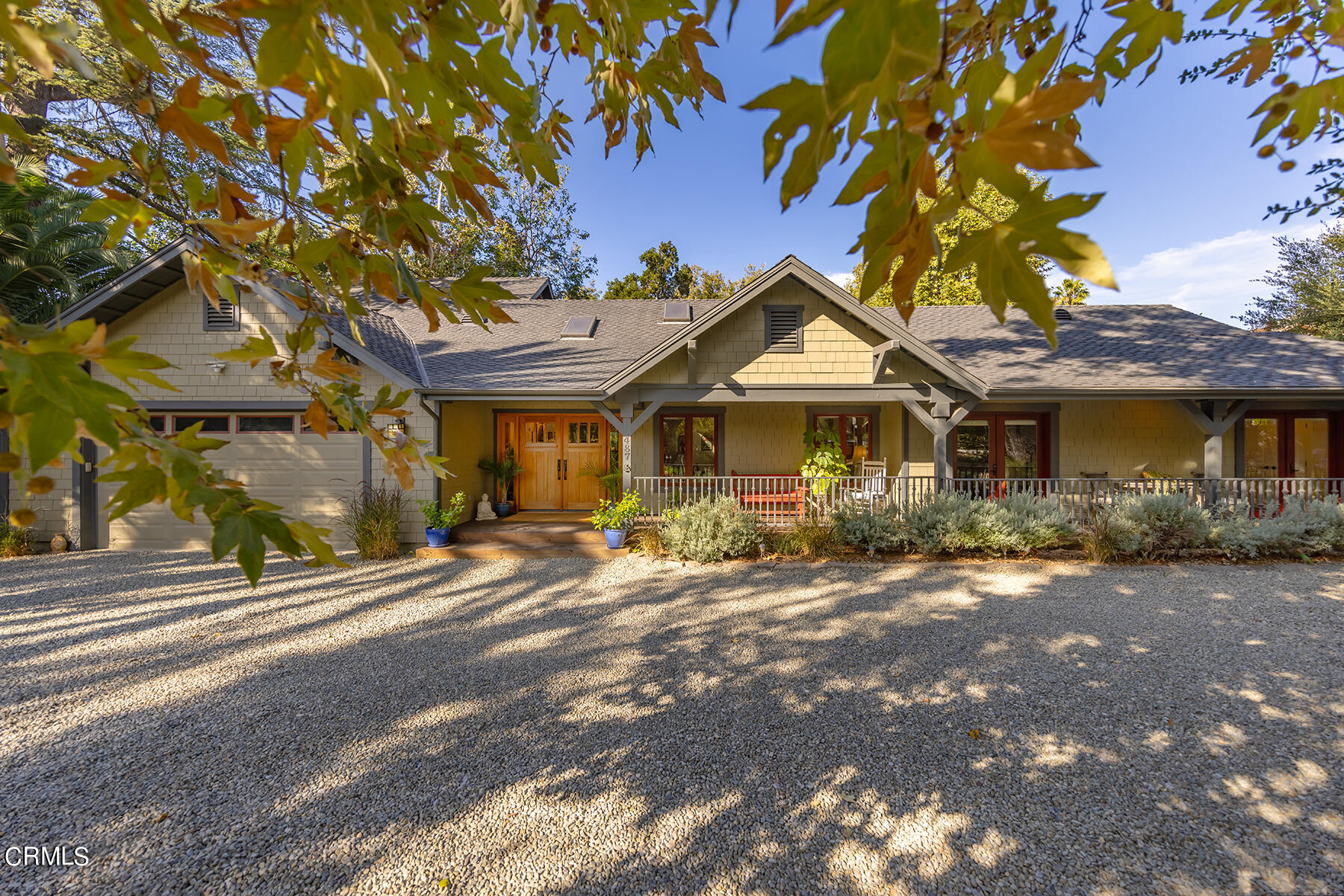 487 Gridley Road Ojai, CA 93023 - Photo 5 of 22 a front view of a house with a garden