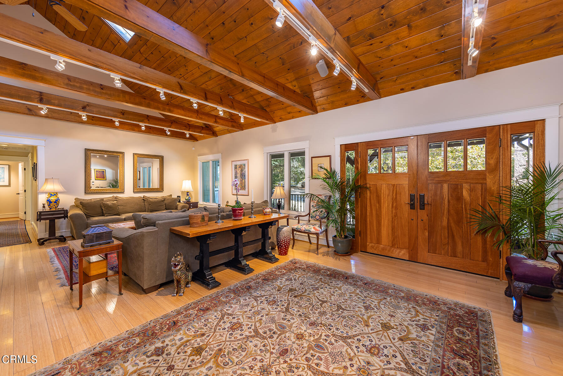 487 Gridley Road Ojai, CA 93023 - Photo 6 of 22 a living room with lots of furniture and wooden floor