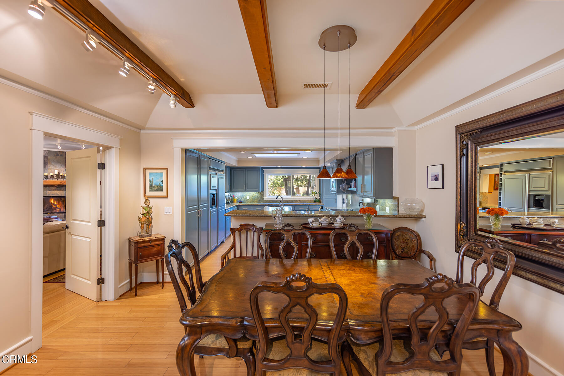 487 Gridley Road Ojai, CA 93023 - Photo 8 of 22 a view of a dining room with furniture and wooden floor