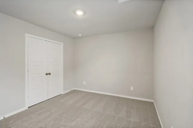 a bathroom with a toilet a sink and bathtub
