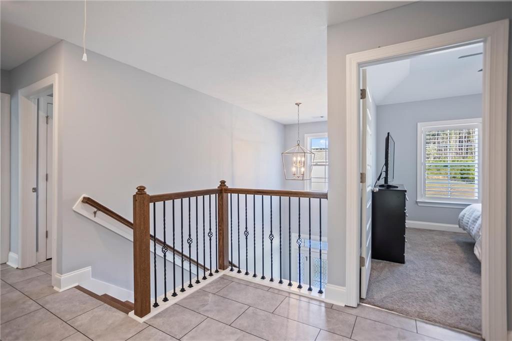 767 Fordham Road Grovetown, GA 30813 - Photo 12 of 32 a view of a hallway with windows and stairs
