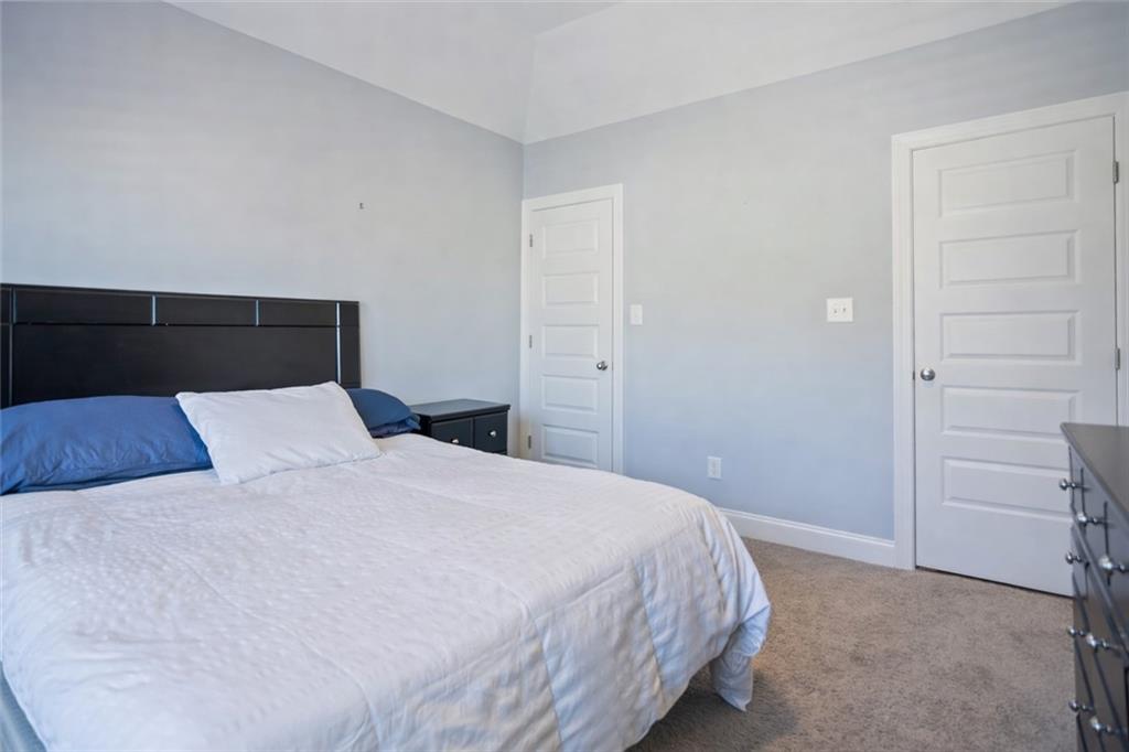 767 Fordham Road Grovetown, GA 30813 - Photo 14 of 32 a bedroom with a bed and cabinet