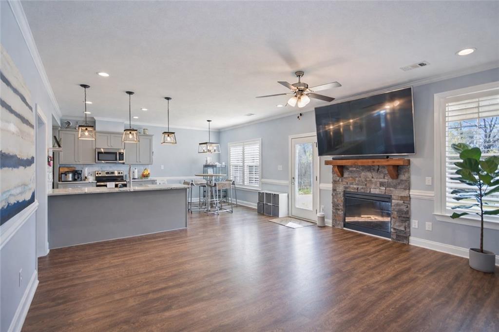 767 Fordham Road Grovetown, GA 30813 - Photo 2 of 32 a living room with stainless steel appliances furniture fireplace and flat screen tv