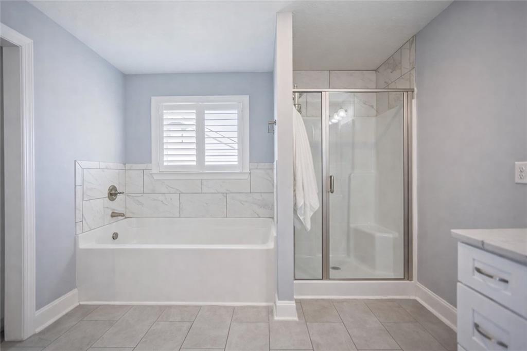767 Fordham Road Grovetown, GA 30813 - Photo 21 of 32 a bathroom with a bathtub and a shower