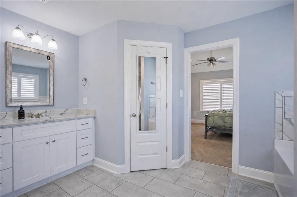 767 Fordham Road Grovetown, GA 30813 - Photo 23 of 32 a bathroom with a double vanity sink a and mirror