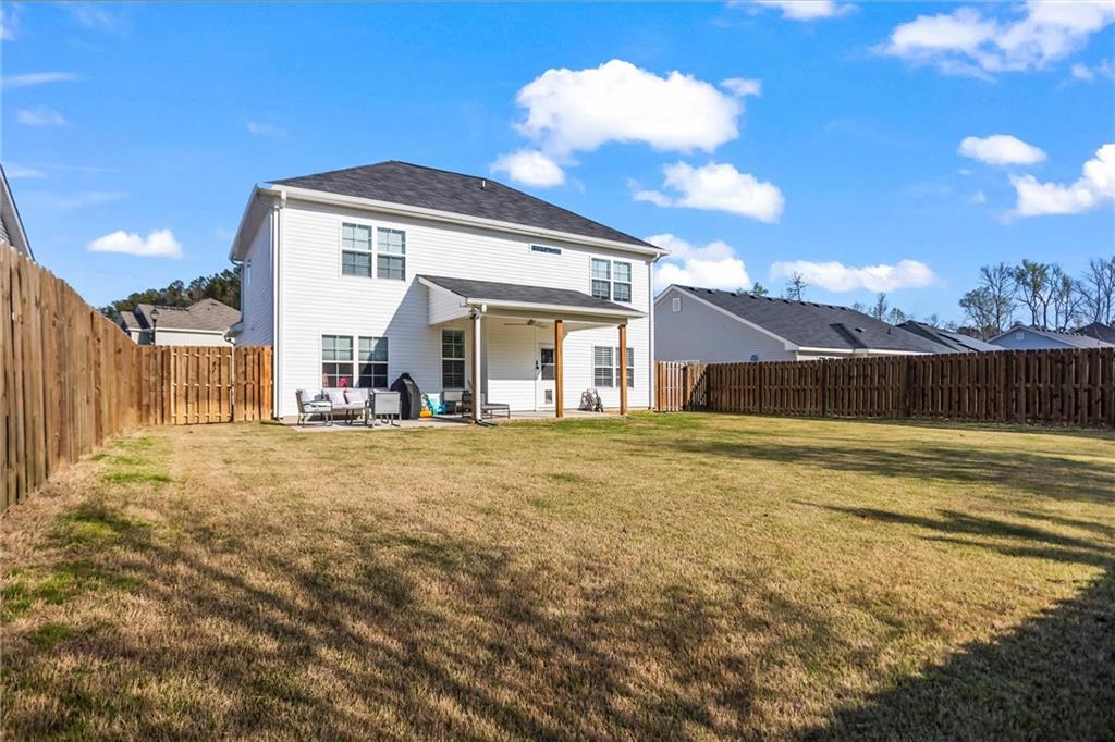767 Fordham Road Grovetown, GA 30813 - Photo 25 of 32 a view of a house with backyard and sitting area