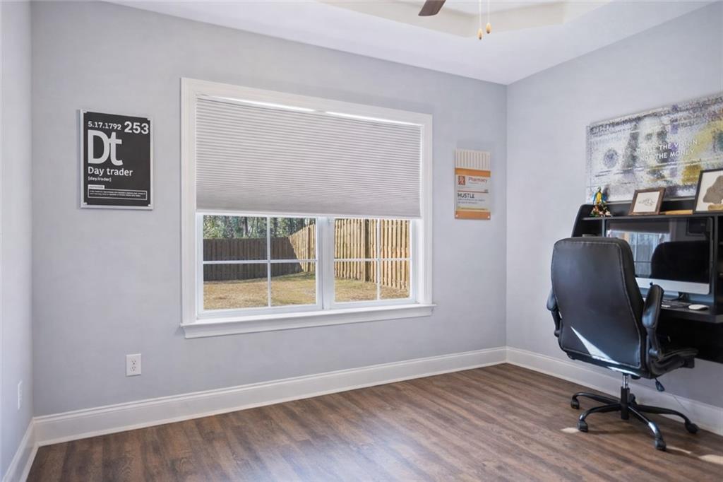 767 Fordham Road Grovetown, GA 30813 - Photo 9 of 32 a view of workspace with wooden floor and windows