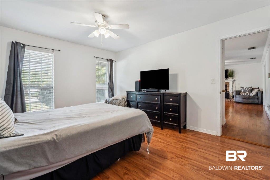 3616 Vista Ridge Drive Mobile, AL 36693 - Photo 10 of 20 Bedroom with ceiling fan and wood-type flooring