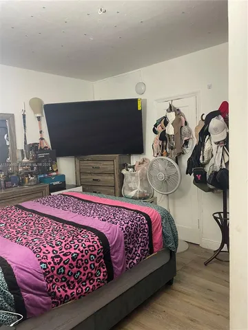 a bed room with a bed and a couch