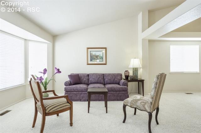 8530 Tibbs Road Peyton, CO 80831 - Photo 1 of 15 Formal Living Room off Entry with Bay Window