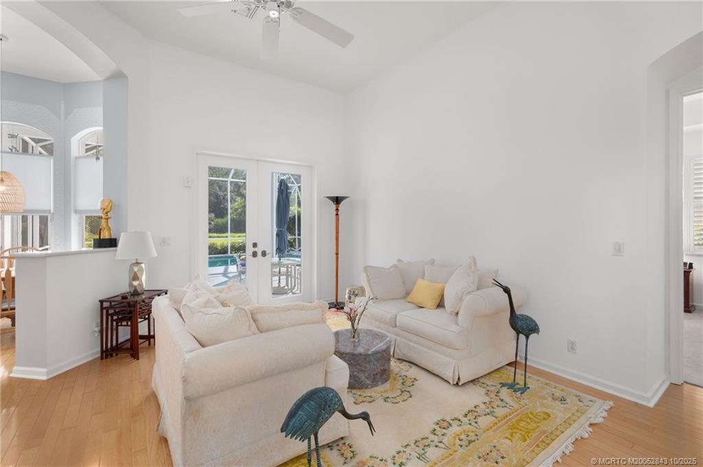 2227 Southeast Stonehaven Road Port St. Lucie, FL 34952 - Photo 12 of 35 a living room with furniture and wooden floor