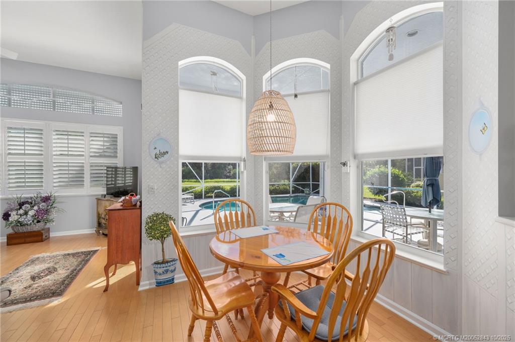 2227 Southeast Stonehaven Road Port St. Lucie, FL 34952 - Photo 15 of 35 a view of a dining room with furniture window and outside view